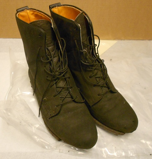 Black leather women's boots worn by Carol Orazem on Sept. 11, 2001. Gift of Carol Orazem.