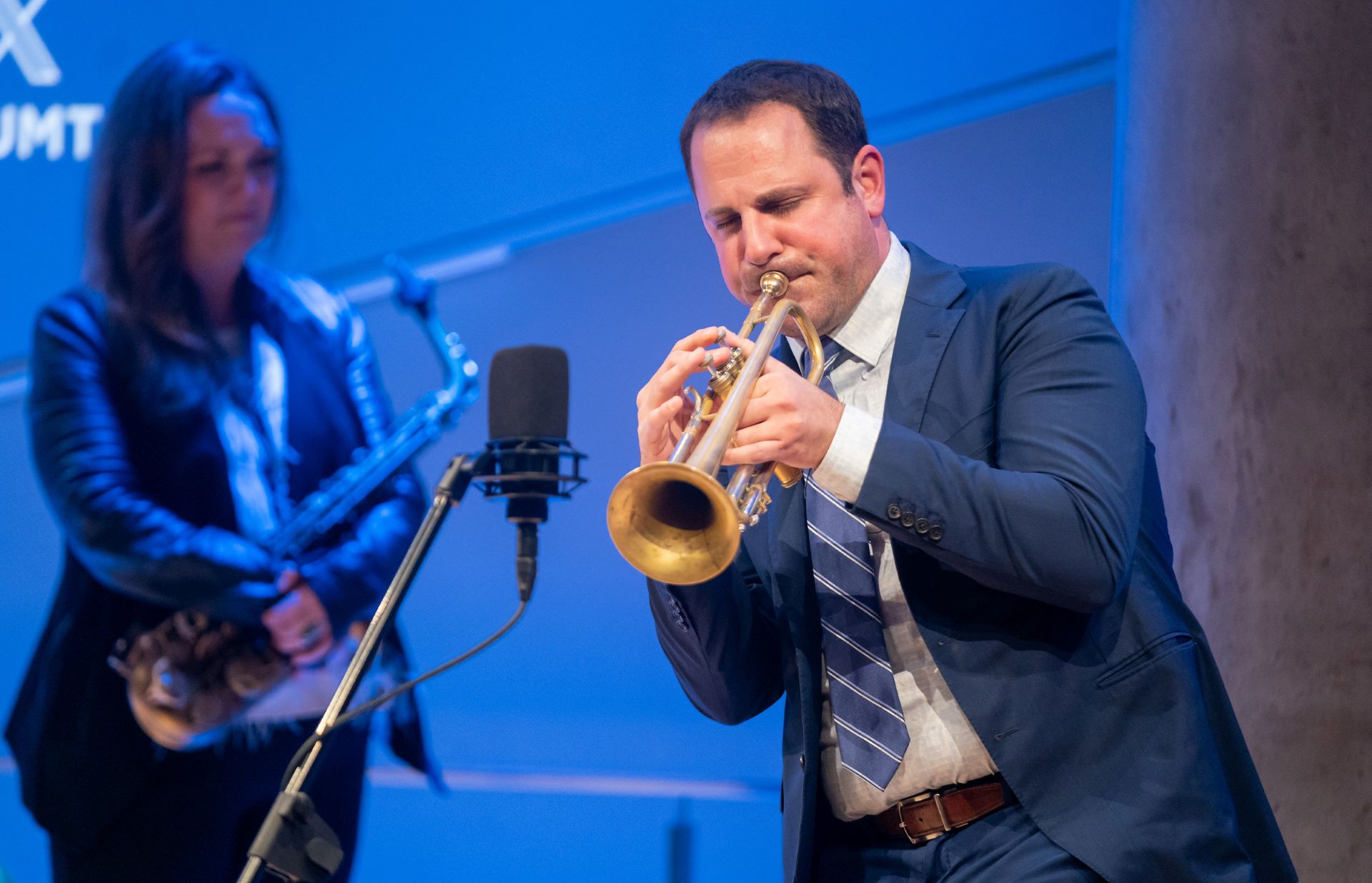 Closeup of man playing trumpet