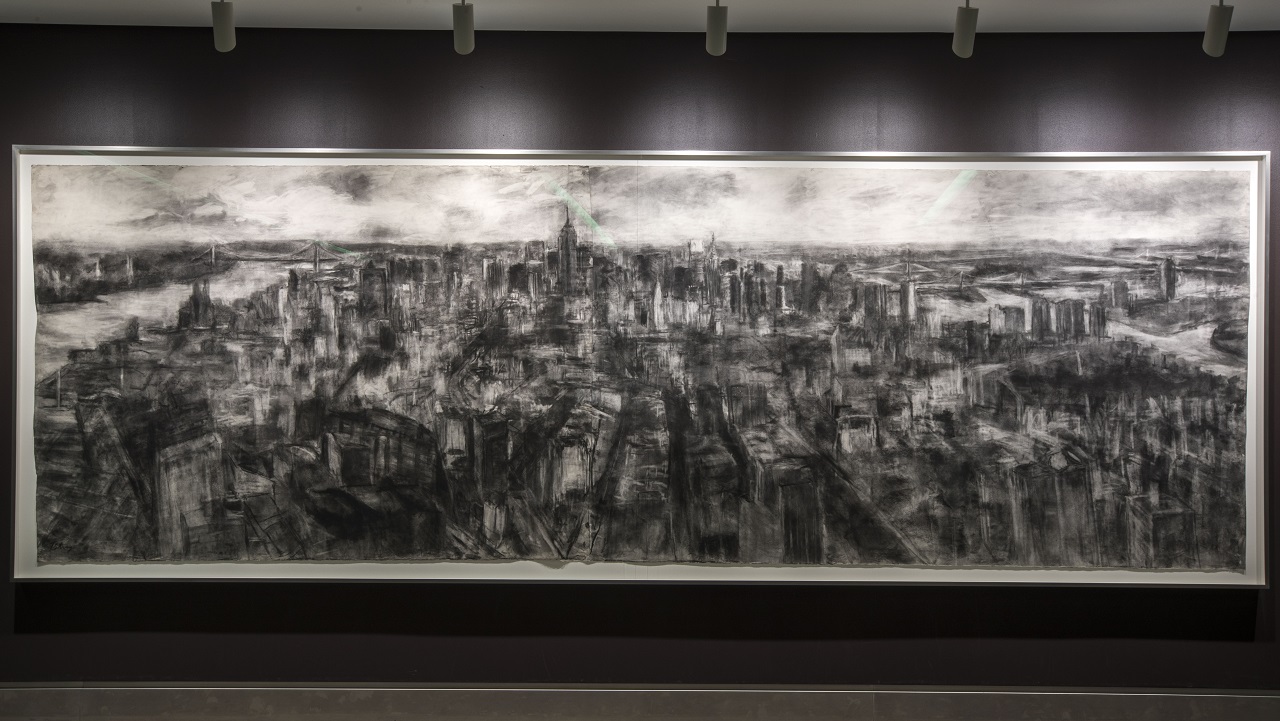 Oblong charcoal artwork of panoramic aerial view of city skyscape dominating four-fifth of the canvas. 