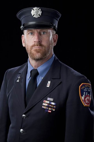 Tim Brown in an FDNY dress uniform.