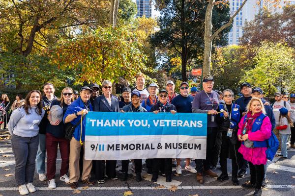On Veterans Day, Memorial staff and volunteers lead the NYC Veterans Day Parade. 