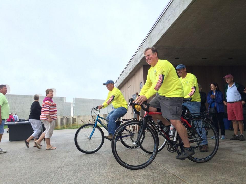 David Brickley, president of the September 11th National Memorial Trail Alliance, leaves the Flight 93 Memorial Visitor Center with the group’s vice president, Andy Hamilton, and the group’s board member, Ben Swecker.