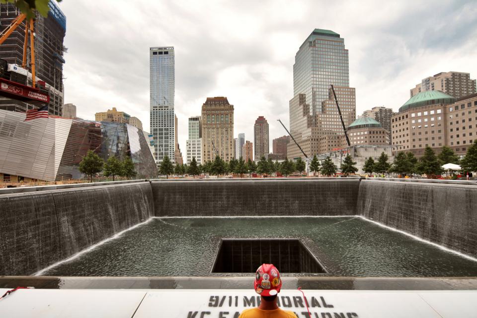 A view of the north reflecting pool of the 9/11 Memorial in June. (By Joe Woolhead) National_9.11_Memorial_June_2011_-_Credit_Joe_Woolhead_(91).jpg