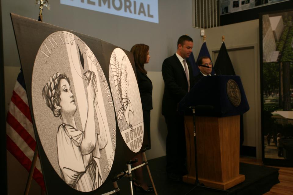 From left, U.S. Treasurer Rosa Rios, 9/11 Memorial President Joe Daniels and Rep. Jerrold Nadler today unveiled the official 9/11 medal commemorating the 10-year anniversary in lower Manhattan. (Amy Dreher photo) OfficialMedal.jpg