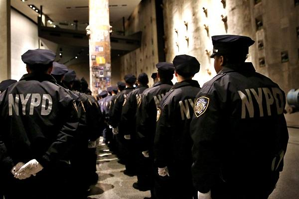 NYPD recruits gather in Foundation Hall stand near the Last Column in Foundation Hall after a wreath-laying ceremony on the Memorial plaza.