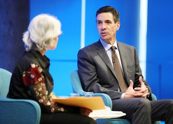 Former Boston Globe reporter Michael Zuckoff speaks to Amy Weinstein, the senior curator of oral history and vice president of collection at the 9/11 Memorial Museum. The two are seated as they talk onstage in the Museum’s auditorium.