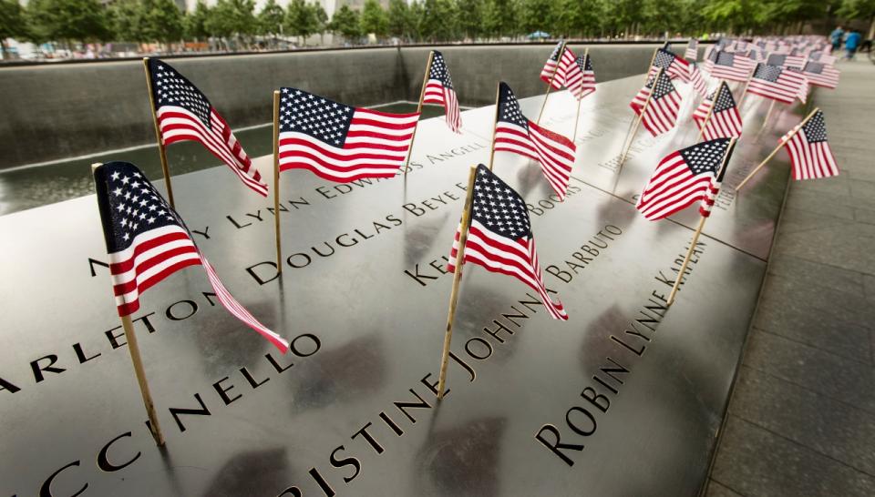An array of American flags that were placed inside the names on the bronze parapets on the 9/11 Memorial.